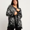Caban jacquard con fantasia floreale