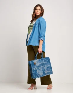 Camicia in denim con colletto e taschine