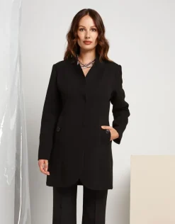 Cappotto con bottoni sulle tasche