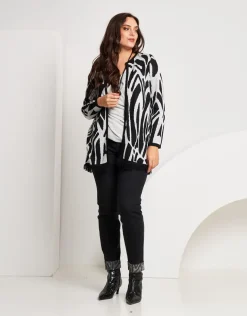 Cardigan bicolore con frange