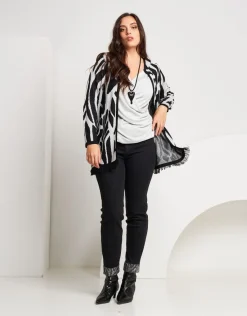 Cardigan bicolore con frange
