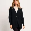 Cardigan in maglia lurex con volant e bottoni