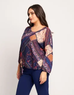 Casacca a ponchetto fantasia patch