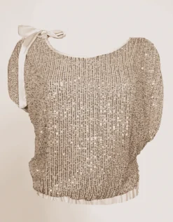 Casacca asimmetrica con paillettes e fiocco