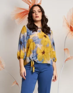 Casacca in fantasia gialla con fiocco