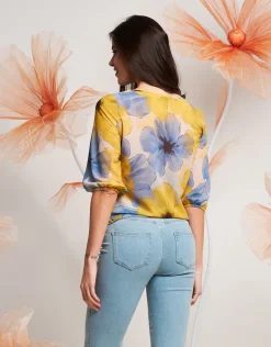 Casacca in fantasia gialla con fiocco