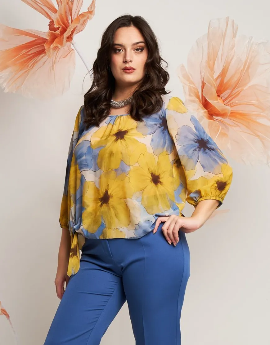 Casacca in fantasia gialla con fiocco