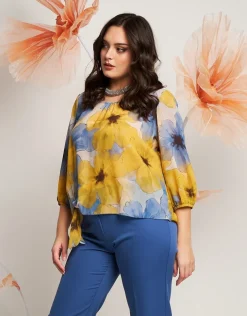 Casacca in fantasia gialla con fiocco