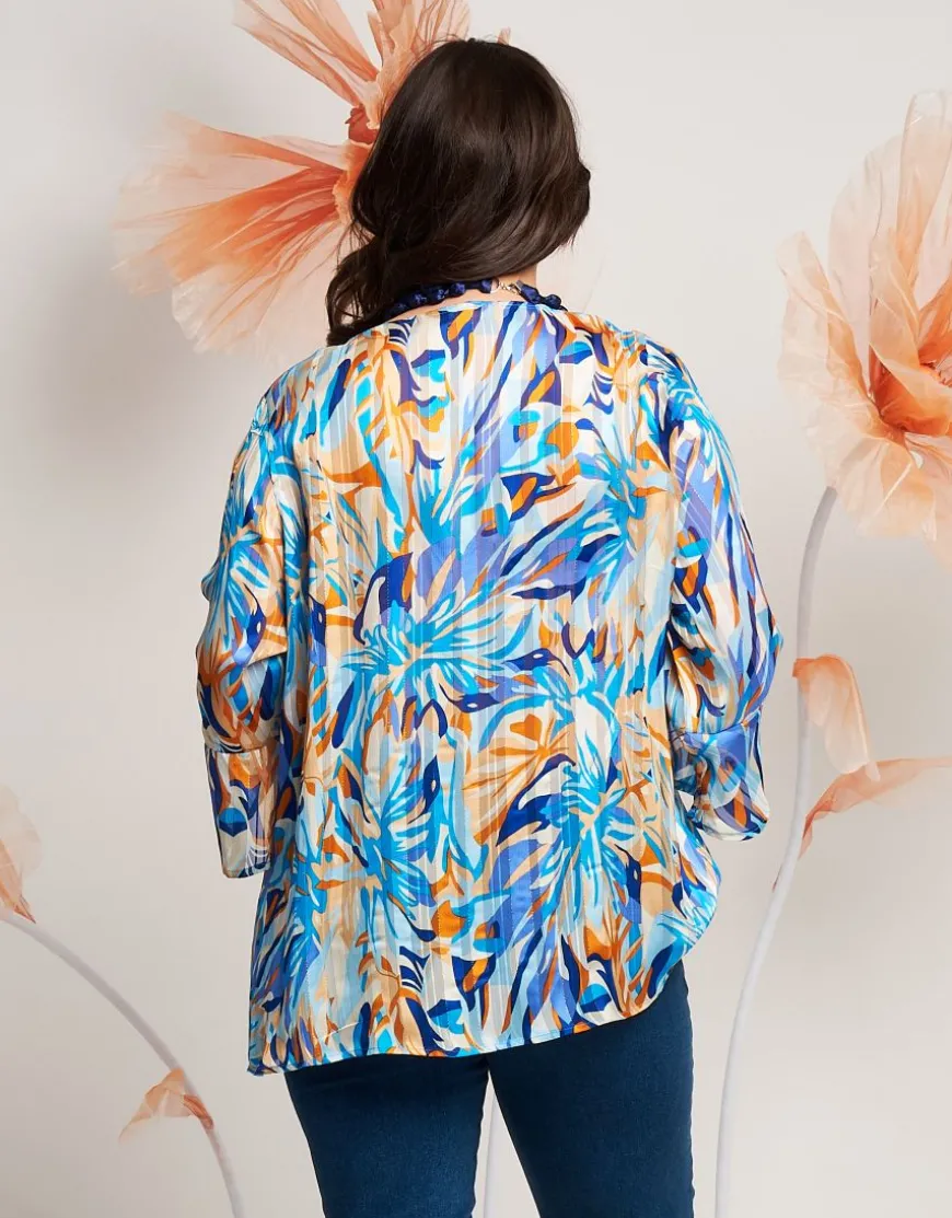 Casacca in georgette con scollo a V e volant