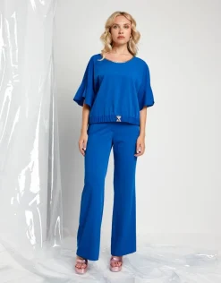 Casacca in tessuto fluido con cinturino e dettagli in lurex