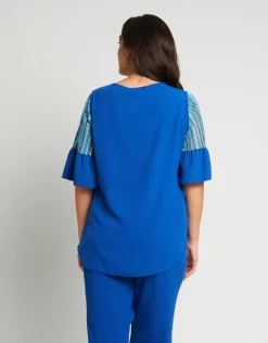 Casacca in viscosa con inserti in rete