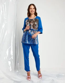 Casacca lunga con cinturino e paillettes animalier