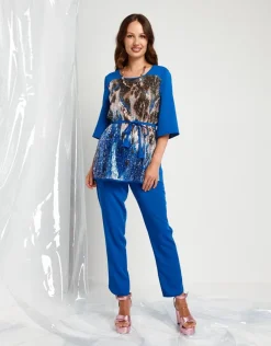 Casacca lunga con cinturino e paillettes animalier