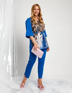 Casacca lunga con cinturino e paillettes animalier