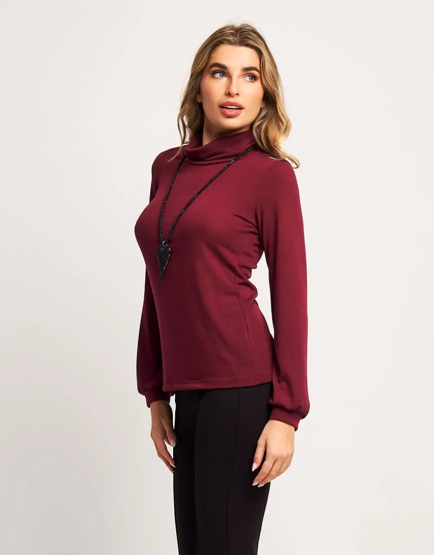 Dolcevita in maglia con maniche a sbuffo