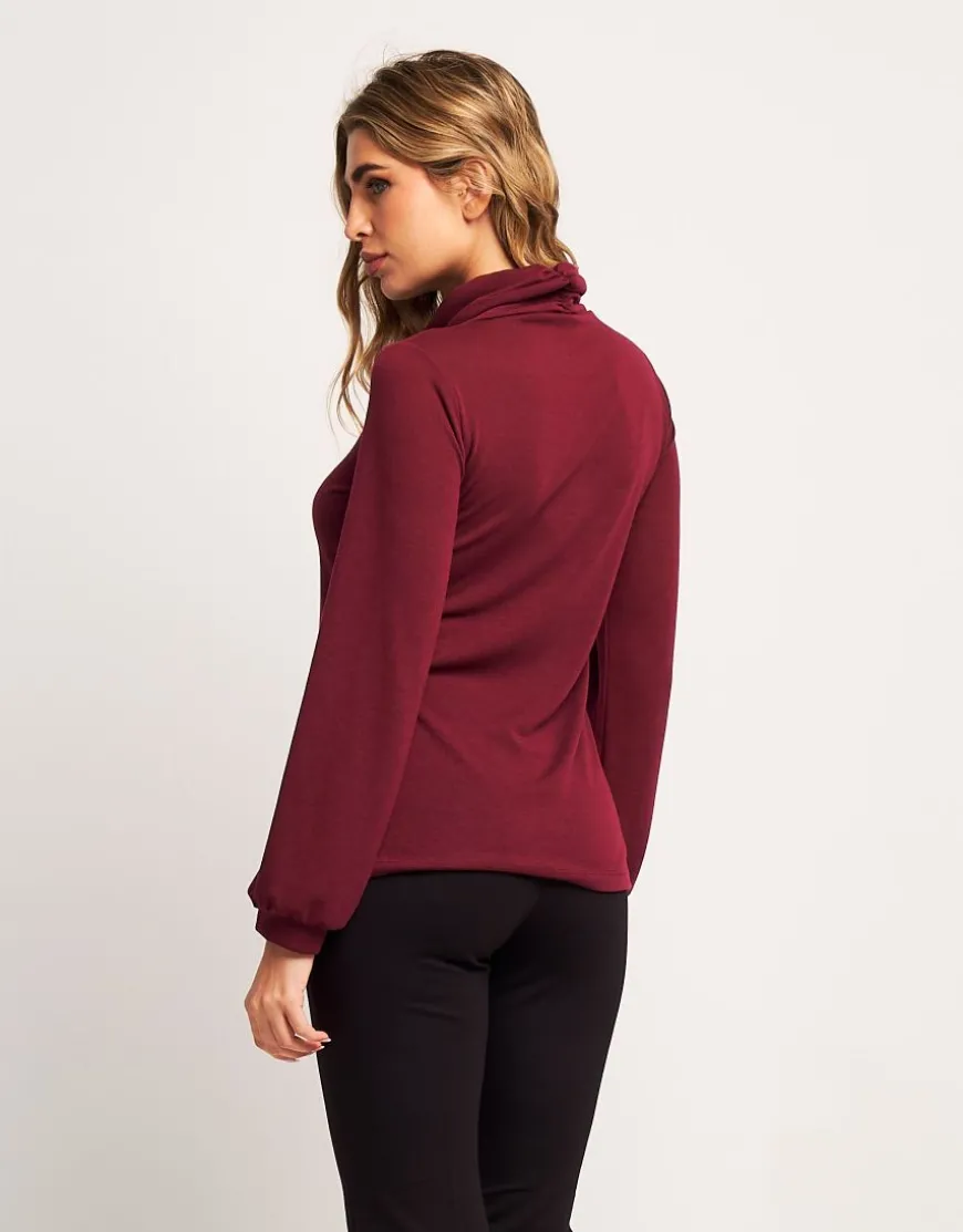 Dolcevita in maglia con maniche a sbuffo
