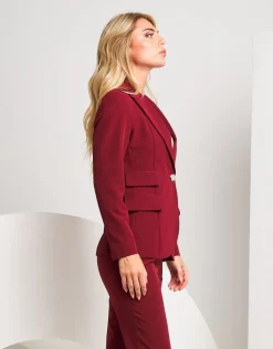 Giacca con revers e pattine laterali