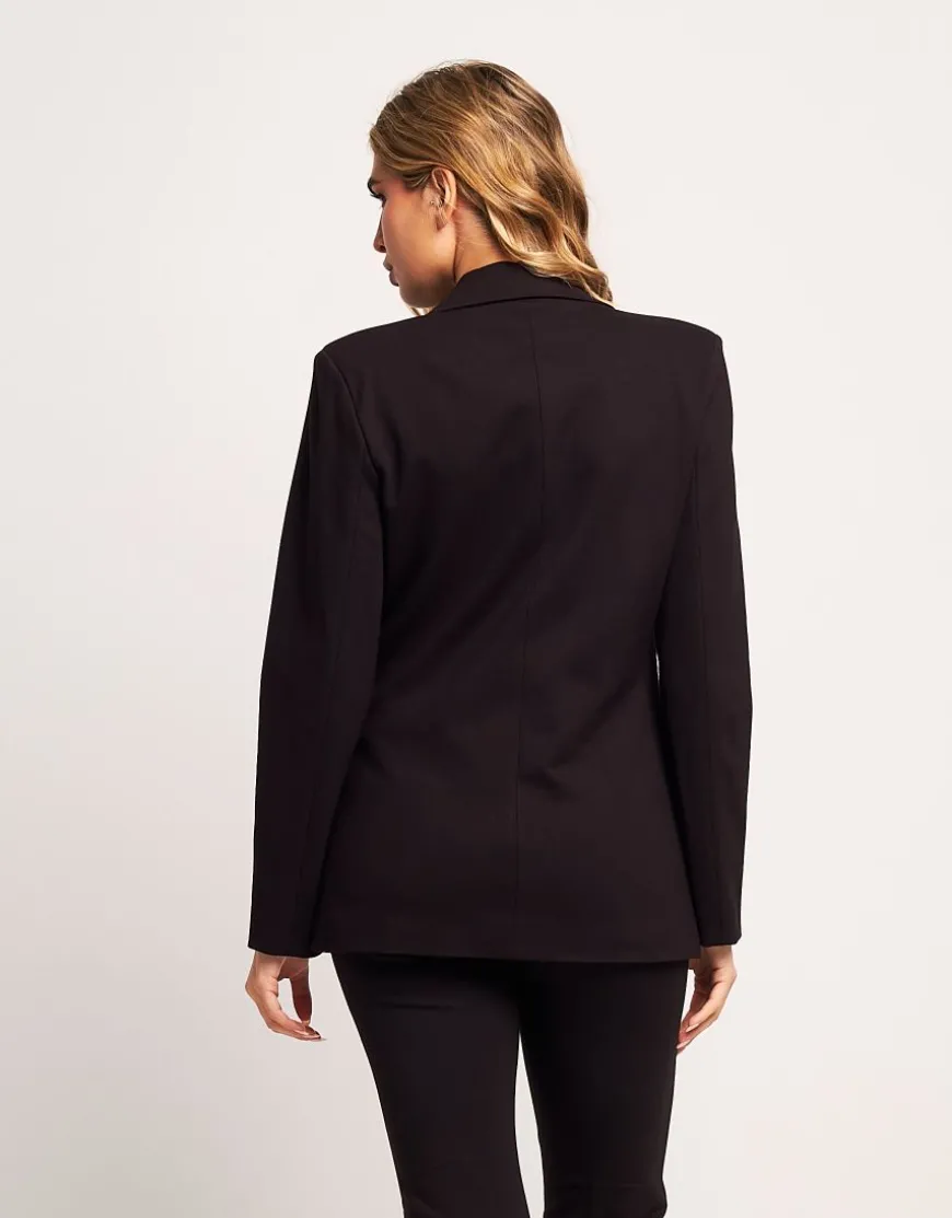 Giacca con revers e pattine