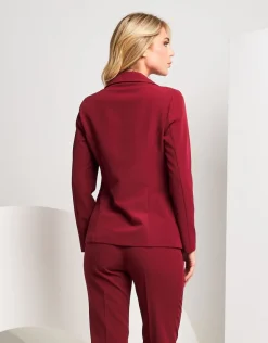 Giacca con revers e pattine laterali