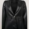 Giacca effetto ecopelle con revers e pattine