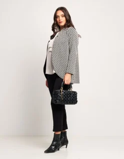 Giacca jacquard a pois con collo revers