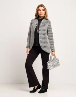 Giacca jacquard a pois con collo revers
