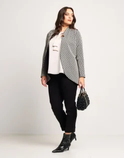 Giacca jacquard a pois con collo revers