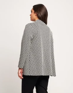 Giacca jacquard a pois con collo revers