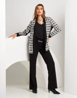 Giacca lunga bouclé con paillettes