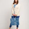 Giacca lunga in ecosuede con borchie