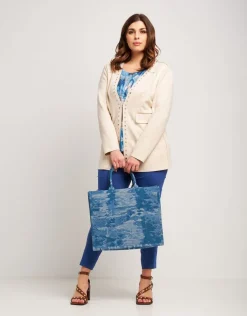 Giacca lunga in ecosuede con borchie