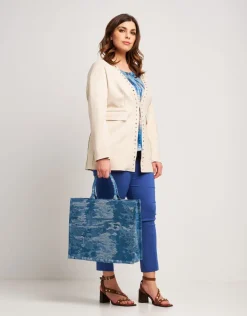 Giacca lunga in ecosuede con borchie