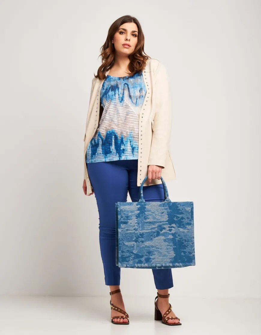 Giacca lunga in ecosuede con borchie