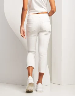 Jeans bianco con bottoni sul fondo