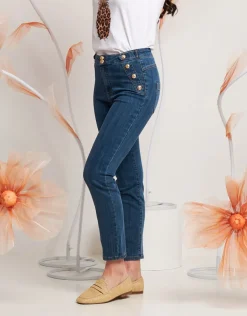 Jeans con bottoni oro in vita