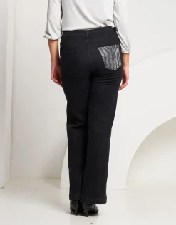 Jeans largo con tasca animalier