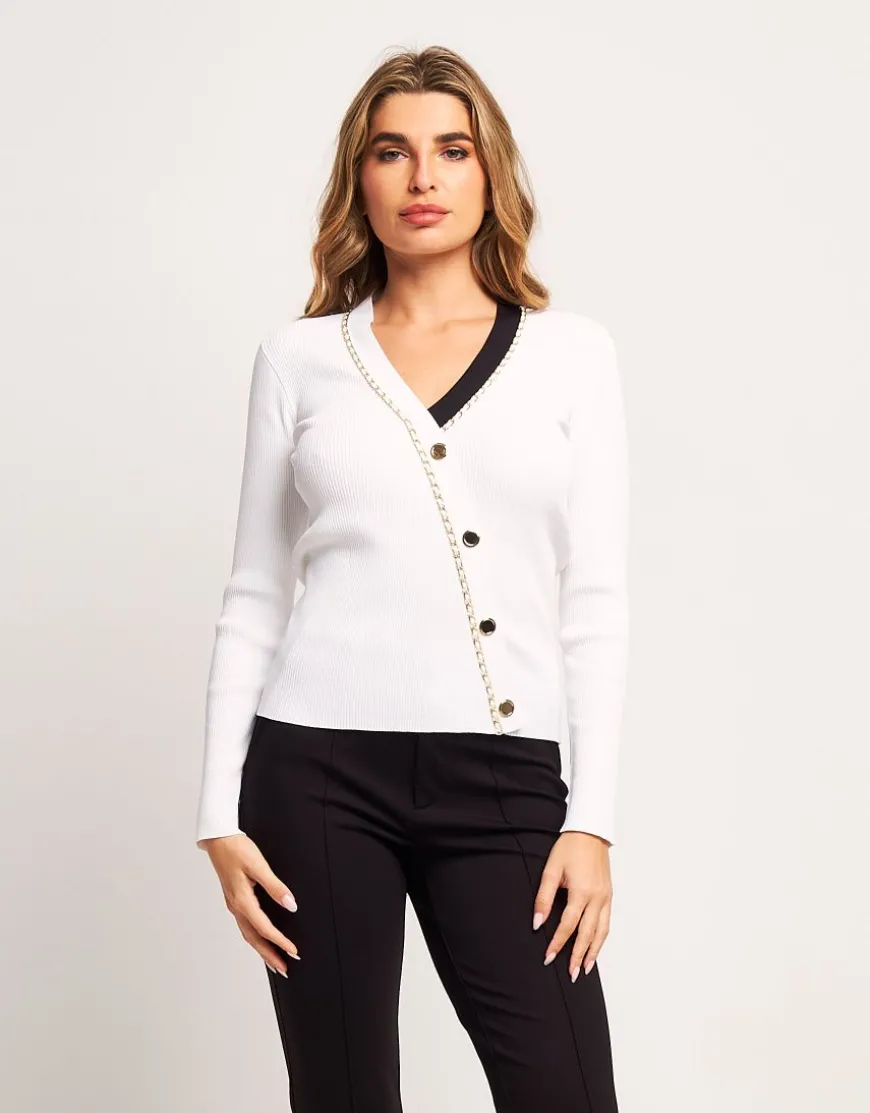 Maglia a coste con accessori dorati