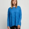 Maglia a poncho con lavorazioni
