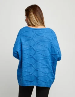 Maglia a poncho con lavorazioni