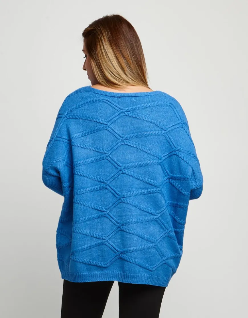 Maglia a poncho con lavorazioni