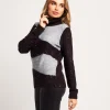 Maglia bicolore con collo alto e paillettes