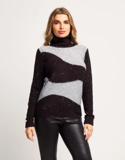 Maglia bicolore con collo alto e paillettes