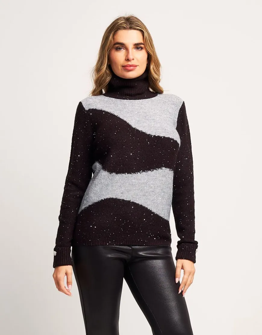 Maglia bicolore con collo alto e paillettes