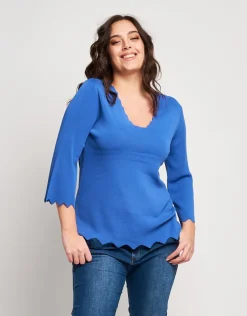 Maglia con bordi ondulati