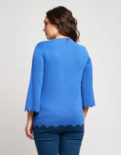 Maglia con bordi ondulati