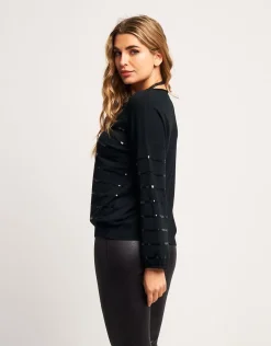 Maglia con maniche a palloncino e paillettes