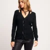 Maglia con treccia con diamanti e paillettes