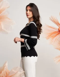 Maglia in maglia battuta con cappe