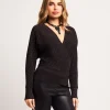 Maglia incrociata a coste con lurex