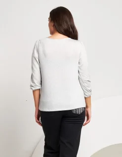 Maglia lurex con gocce e incrocio